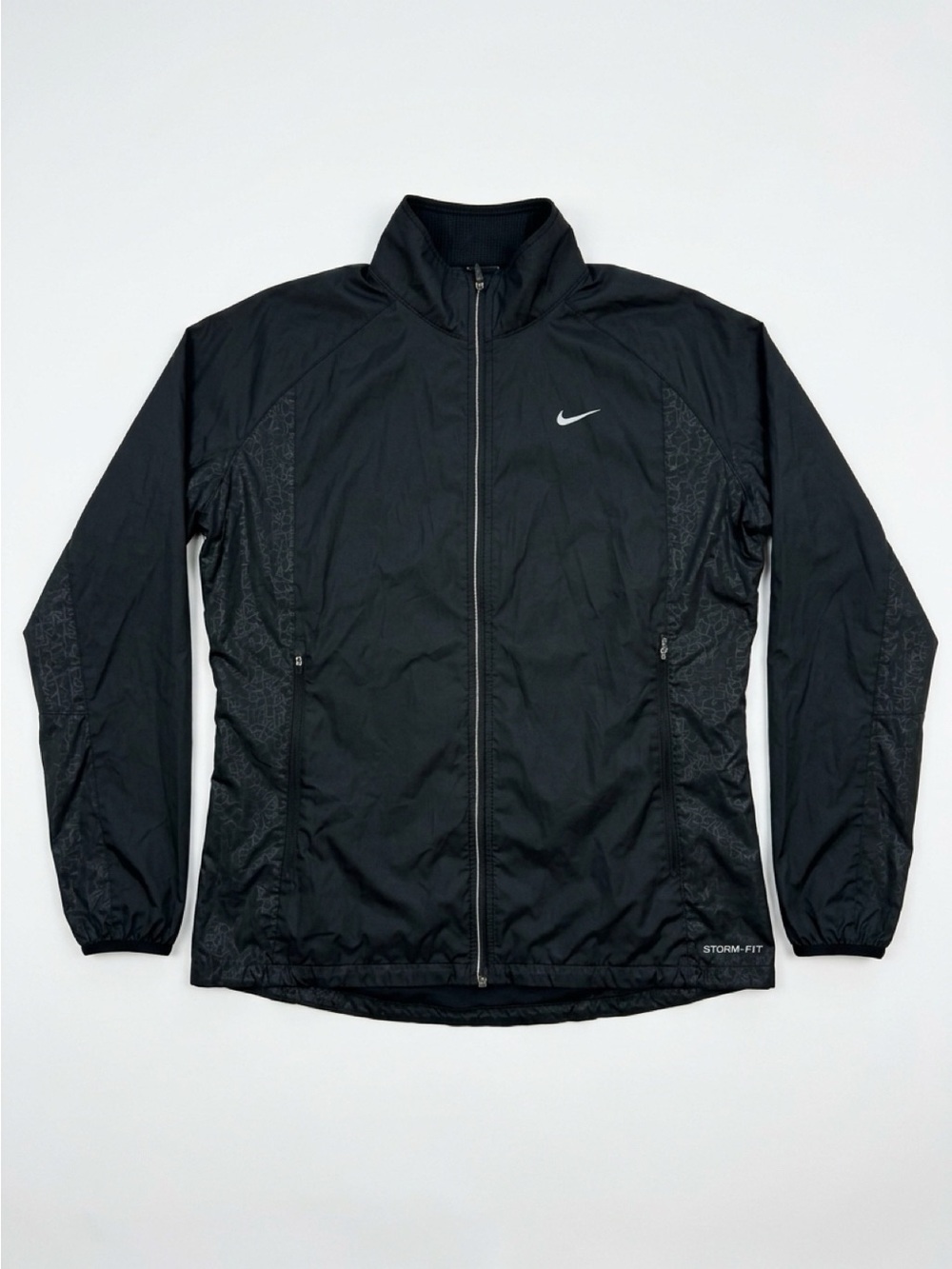 Nike Storm-FIT black women’s training full zip training jacket geometric pattern